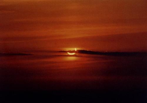 Middle of eclipse - recorded with mirror reflex Olympus IS-200 on 200 iso Agfa